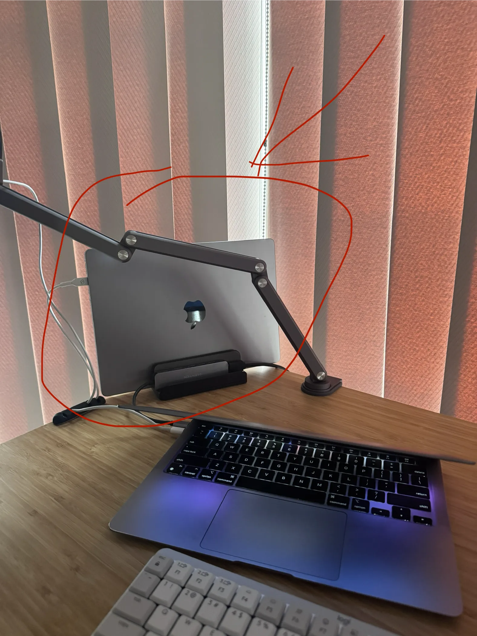 A spare laptop running OpenClaw as a 24-7 AI agent setup on a desk